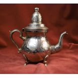 Vintage-White Metal Tea Pot. Decorative floral design. Makers stamp on bottom, elephant with HG next