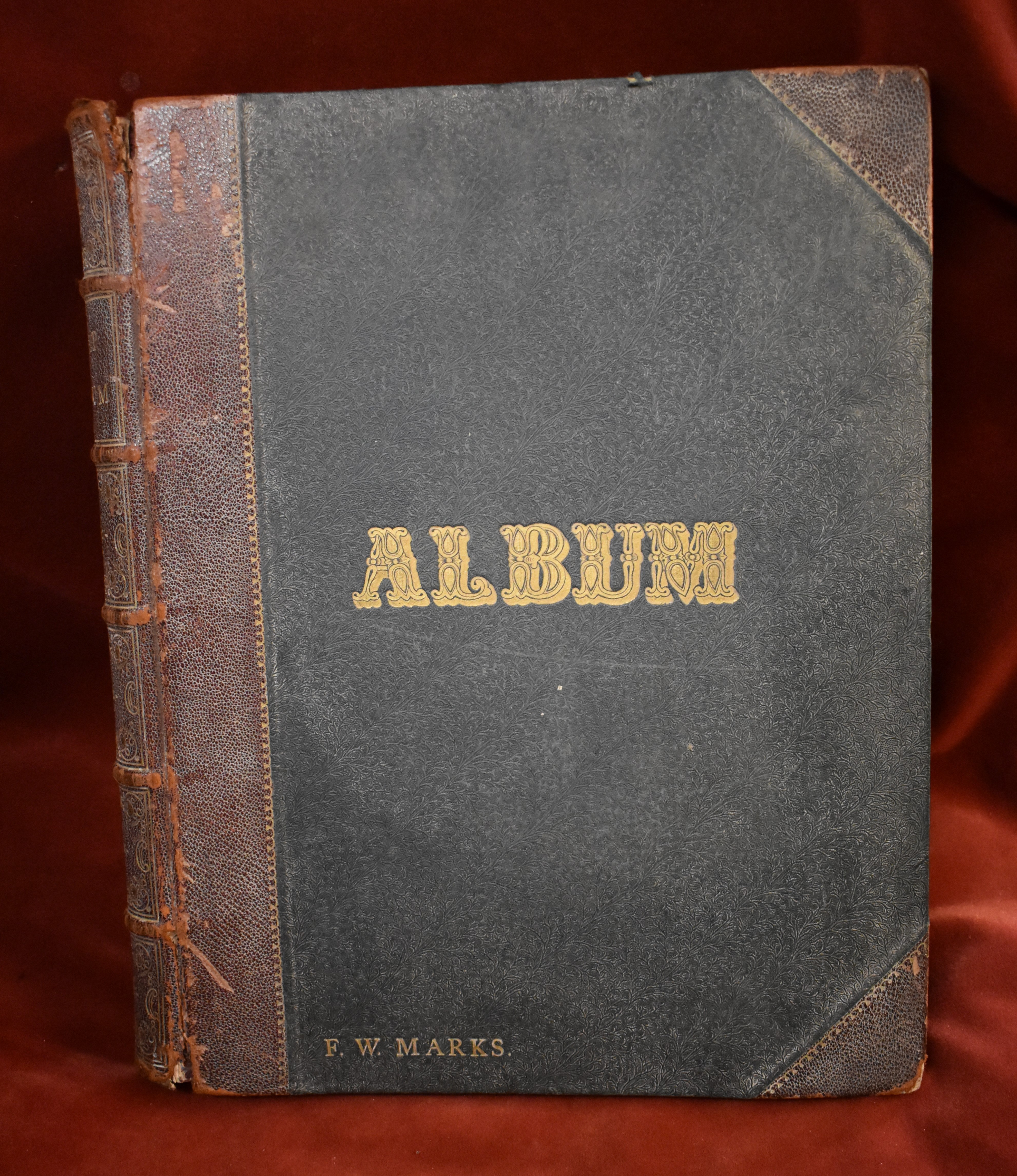 An Antique leather bound scrap Album, empty with clean pages.