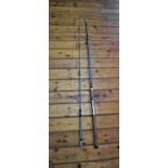 Vintage Cork handled sea fishing rod. 9 foot length in cloth case