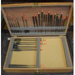 Wooden case filled with various floats of all styles for pole and float rods. Case made in