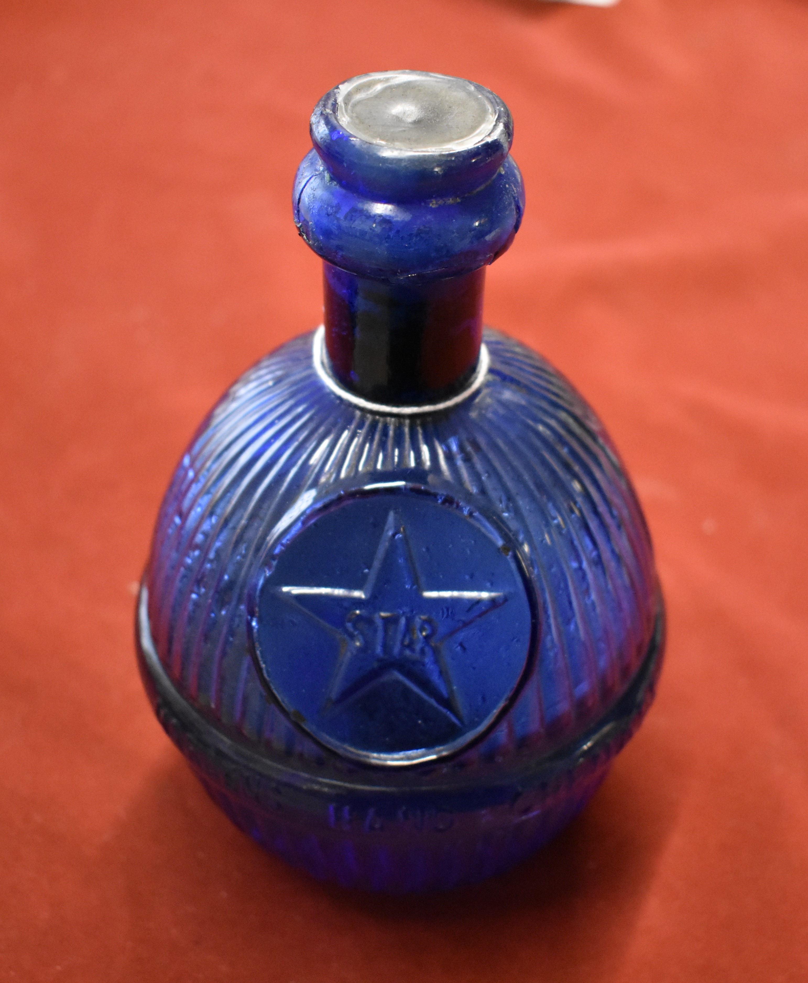 Harden Star Aire Grenade, 7ins tall, cobalt blue glass, spherical shape vertically ribbed with ‘