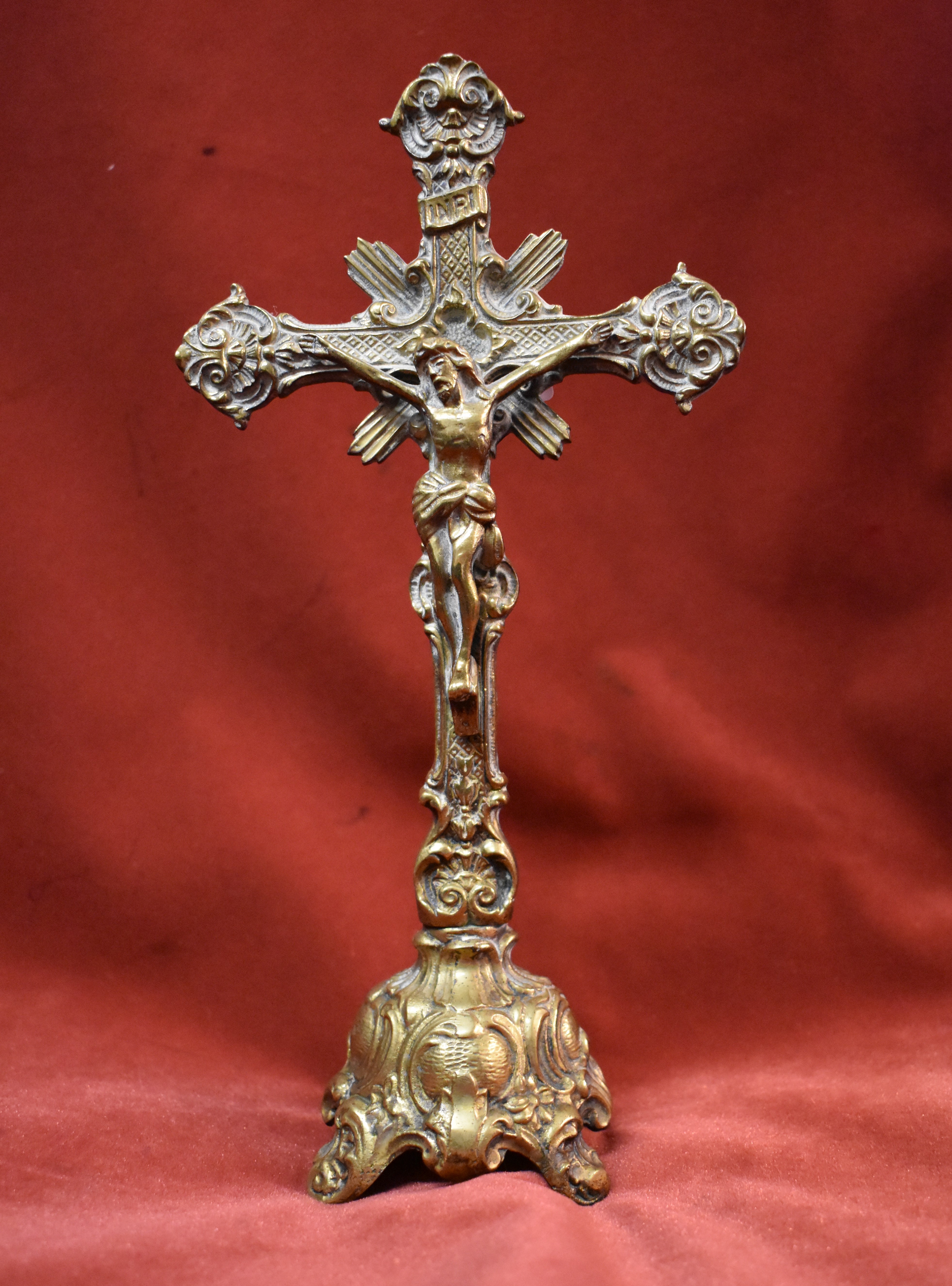 Orthodox Church Brass Footed Crucifix with an ornate floral design, maker marks on the back 'OSE'.