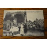 French WWI RP Postcard of a French Priest giving Communion to the Soldiers in the ruins of a Church.