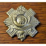 The Highland Light Infantry 5th, 7th and 8th Battalions WWI Territorial Cap Badge (Gilding-metal),