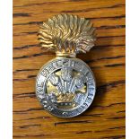 Royal Welsh Fusiliers EIIR Cap Badge (Bi-metal), lugs. Made by Firmin.