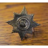 Irish Guards Other Ranks Forage Cap Badge (Gilding-metal). K&K: 914, two lugs.