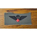 Canadian Service Dress Cloth Paratroop Wings with red maple leaf.