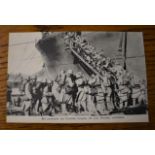 French WWI RP Postcard of Soldiers Boarding a ship for deployment in Salonika. "Het inschepen van