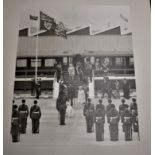 A large photograph of Queen Elizabeth and The Queen Mother's Arrival by Train carriage at The Prince