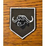 Rhodesian Army 3rd Brigade Shoulder Patch, in the design of an elephant on red backing.