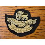 Rhodesian Air Force Pilot Officers Peaked Cap Cloth Patch, Gold Braid on black cloth.