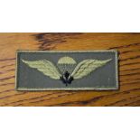 Canadian Service Dress Cloth Paratroop Wings with black maple leaf.