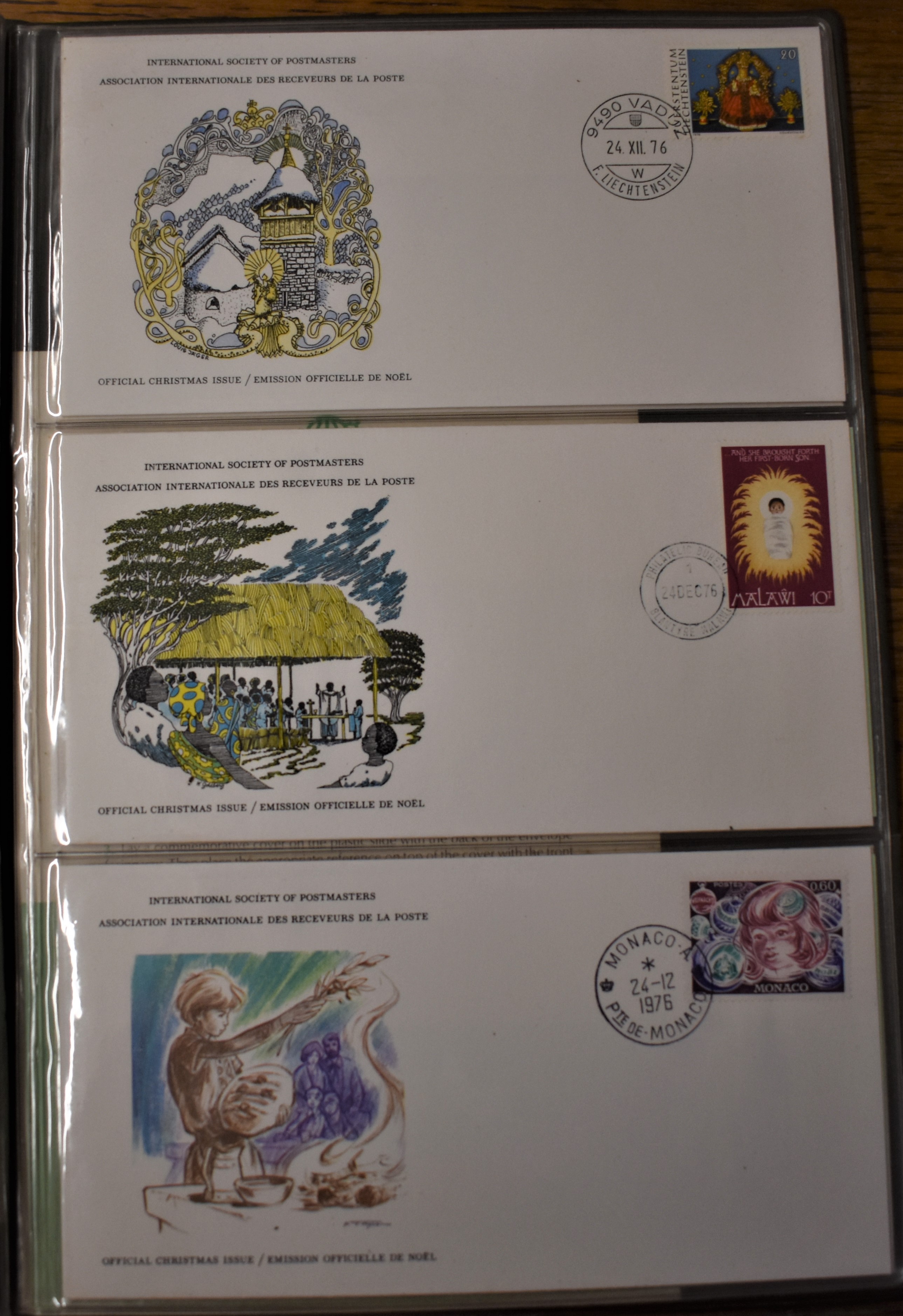 World 1976 Christmas International Covers - An album of issued for collectors. F.D.C. 24/12/76 x12 - Image 3 of 3