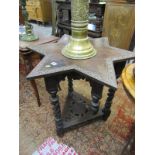 STARBURST TABLE, a carved oak triple barley twist leg support occasional table with starburst