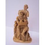 IVORY, a Japanese signed carved ivory group of father seated with 2 children, 6" high