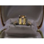 18ct YELLOW GOLD CITRINE & DIAMOND 3 STONE RING, principal rectangular cut citrine in excess of 1.