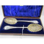 CASED SET OF BERRY SPOONS, a pair of plated berry spoons in fitted case, 9"