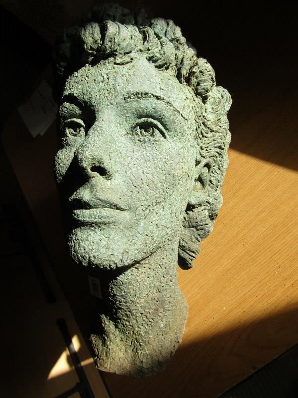 BRONZE HEAD, a cast bronze head of a young lady, 15" high