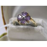 9ct YELLOW GOLD AMETHYST & DIAMOND FLOWER RING, 4 heart cut amethyst stones set in the form of