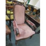 VICTORIAN OPEN ARMCHAIR, a carved oak foliate crested open armchair with barley twist legs and