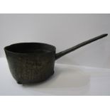 EARLY METALWARE, a bronze long handled skillet