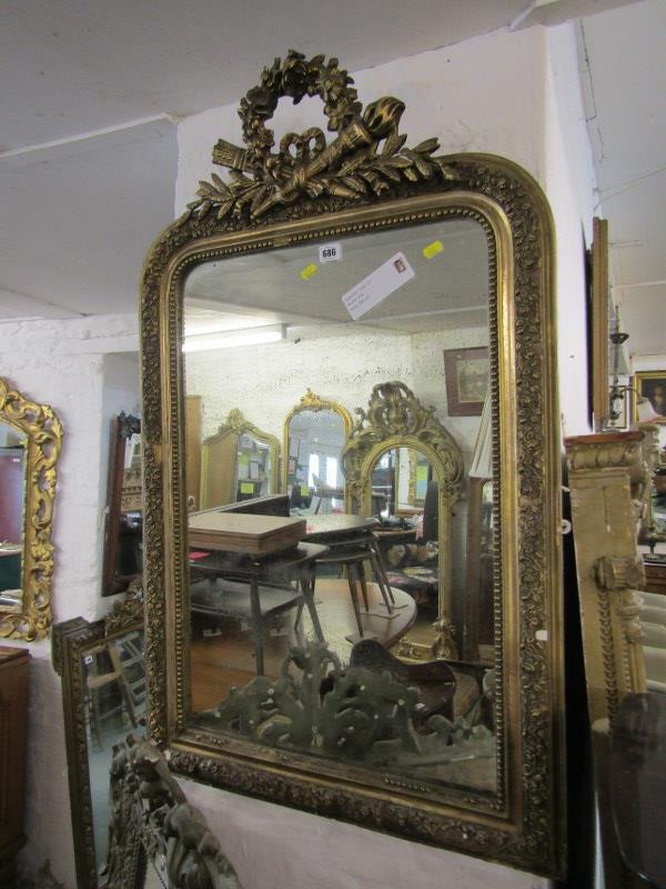 GILT HALL MIRROR, floral wreath and emblem crested hall mirror, 39" height 24" width