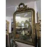 GILT HALL MIRROR, floral wreath and emblem crested hall mirror, 39" height 24" width