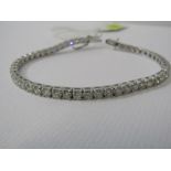 18ct WHITE GOLD BRILLIANT CUT DIAMOND LINE BRACELET, well matched brilliant cut diamonds of good