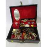 COSTUME JEWELLERY, black jewellery box containing a selection of costume jewellery including