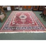 PERSIAN DESIGN CARPET, red ground with foliate & floral decoration