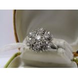 18ct WHITE GOLD DIAMOND FLORAL CLUSTER RING, 7 principal brilliant cut diamonds surrounded by