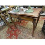 FRENCH CARD TABLE, serpentine fronted fold top card table on carved cabriole legs (requires