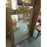 GILT WALL MIRROR, bevelled glass gilt framed rectangular mirror with gilt cresting of floral