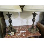 LIGHTING, pair of antique finish metalware candlestick support table lights and shades