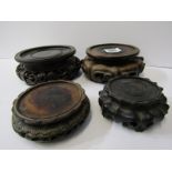 ORIENTAL VASE STANDS, 4 circular carved hardwood vase stands from 3.5" to 5.5" diameter