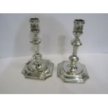 CAST SILVER CANDLESTICKS, a pair of Elizabeth II cast silver candlesticks of classical design on