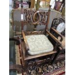 CONTINENTAL ARMCHAIR, ornate carved back walnut open armchair