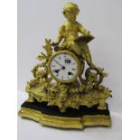 VICTORIAN MANTEL CLOCK, 19th Century French gilt metal mantel clock crested with putti reading and