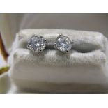 PAIR OF 18ct WHITE GOLD DIAMOND STUD EARRINGS, totalling approx 1.3cts, bright stones of good colour