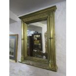 ECCLESIASTICAL GILT MIRROR, rectangular wall mirror decorated with ecclesiastical wall column