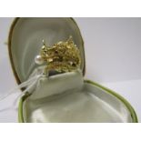 14CT YELLOW GOLD RING IN THE FORM OF A DRAGON CHASING A PEARL, approximately 10.4 grams in weight,