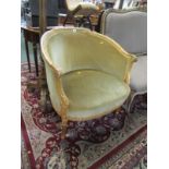 FRENCH TUB ARMCHAIR, carved gilt surround upholstered armchair on tapering fluted legs