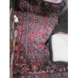 PERSIAN CARPET, red ground Turkoman design (some wear)