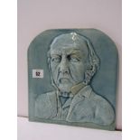 GLADSTONE, Blue glazed portrait plaque "W. Glass made 1898" 10" height