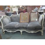 FRENCH STYLE SETTEE, a painted and carved triple seater settee with splayed arms and scroll feet