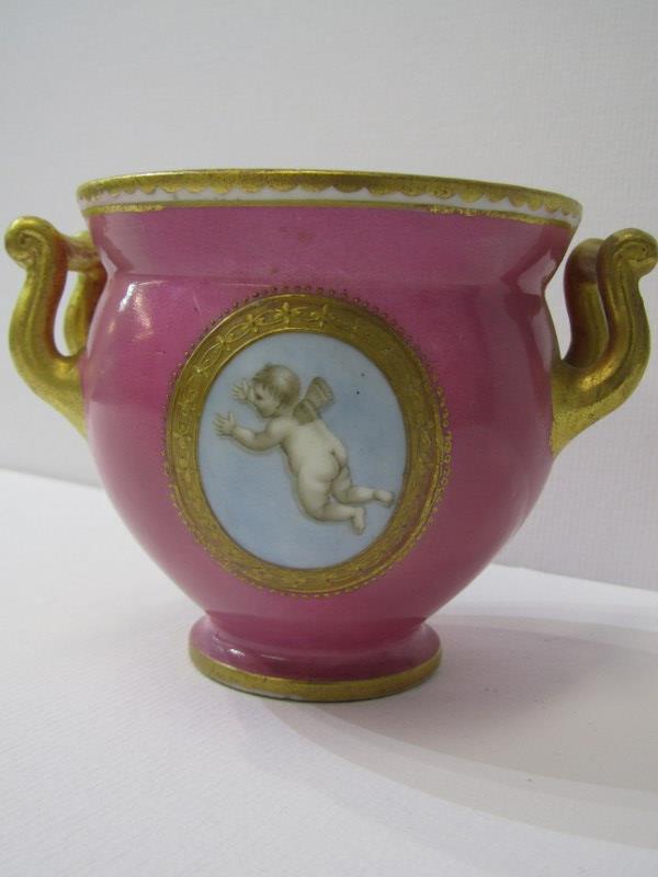 COALPORT, a gilt twin handled pink ground table pot, gilt ampersand mark (restored) - Image 2 of 3