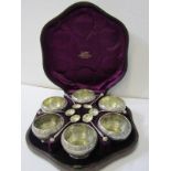 VICTORIAN BOXED SILVER CRUET, a set of 6 circular cruets with foliate engraved decoration & 6