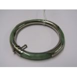 SILVER SET JADE BANGLE, hinged clasp with safety chain