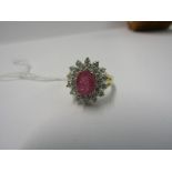 PINK SAPPHIRE & DIAMOND CLUSTER RING, principle oval cut pink sapphire in excess of 1ct surrounded