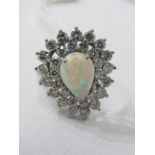 18ct WHITE GOLD OPAL & DIAMOND CLUSTER RING, principal pear cut opal surrounded by 2 rows of